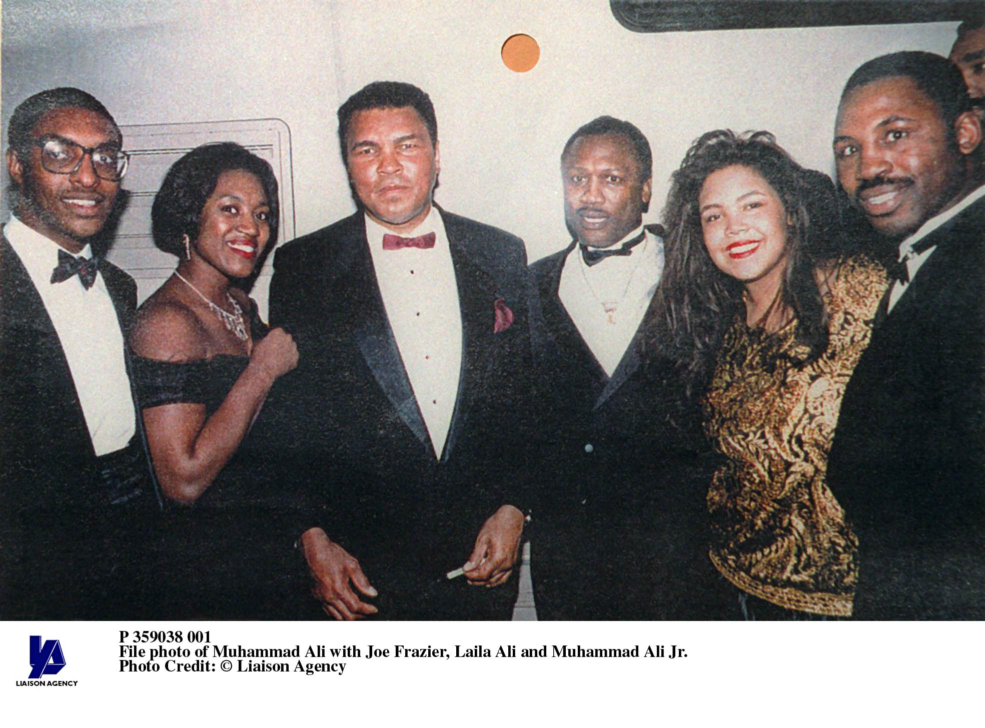 File picture of Khalia Ali, Muhammad's daughter. Here with her father and brother Muhammad Jr.