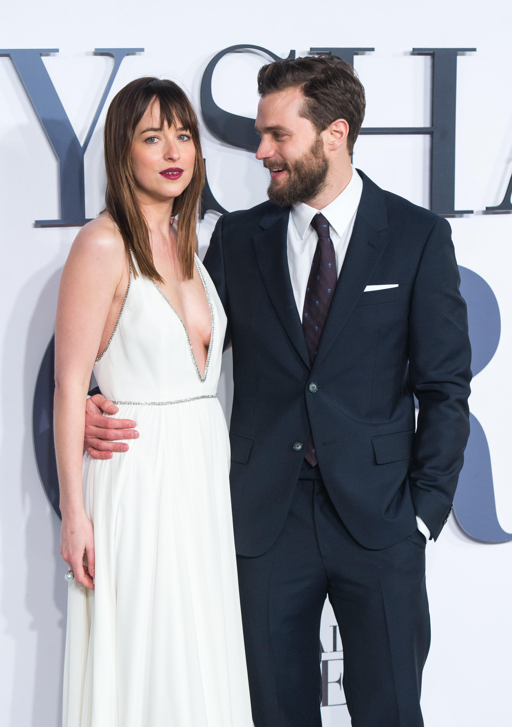 Jamie Dornan and Dakota Johnson attend the UK Premiere of 'Fifty Shades Of Grey'