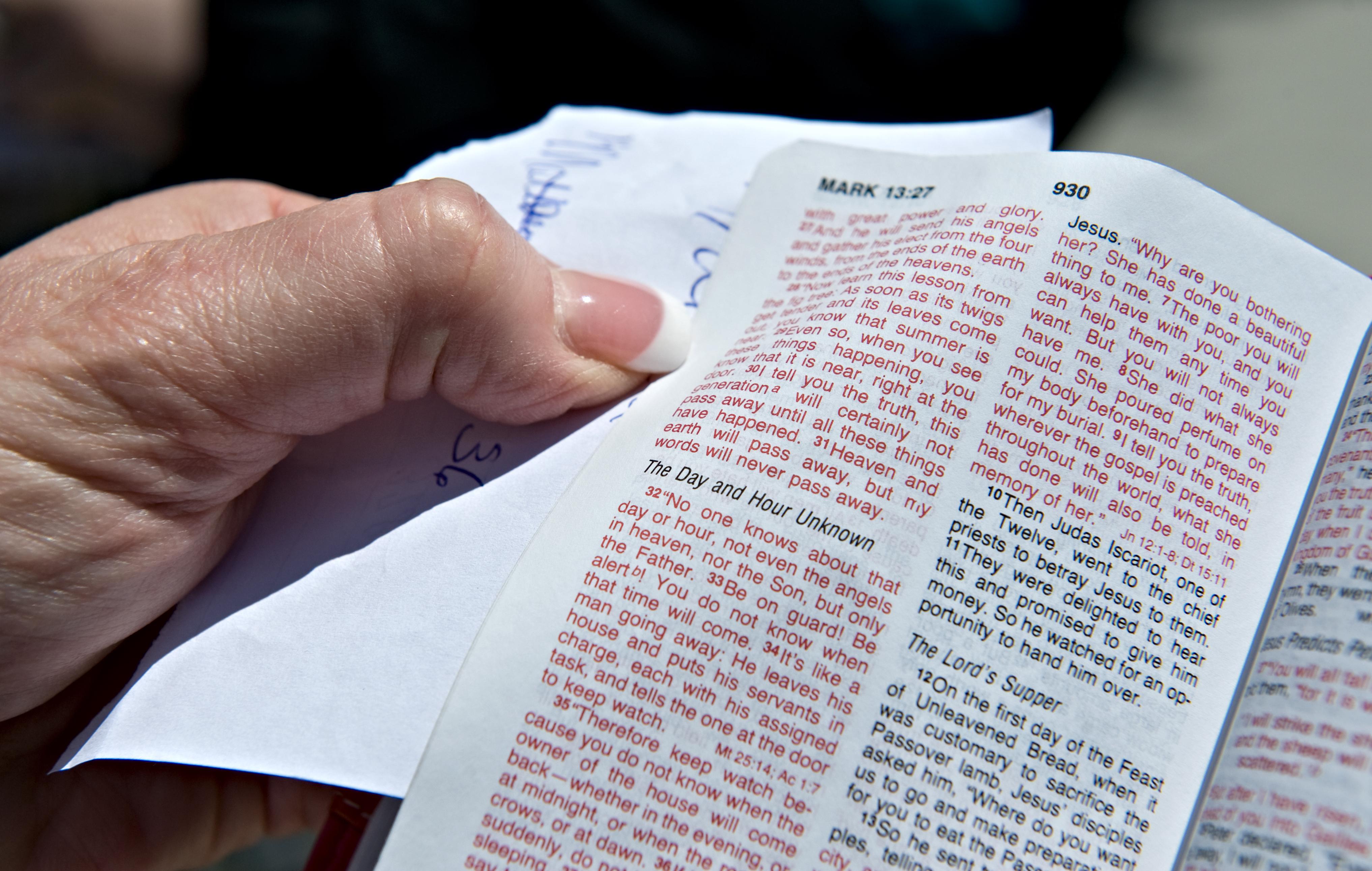 WASHINGTON, DC - MAY 5: Brenda Forester, of Farmington Hills, Michigan, shows off a passage in the bible which she always carry, in Washington D.C., on Thursday, May 5, 2011. Forester, visiting Washington, D.C., for the Day of Prayer, stopped to dis