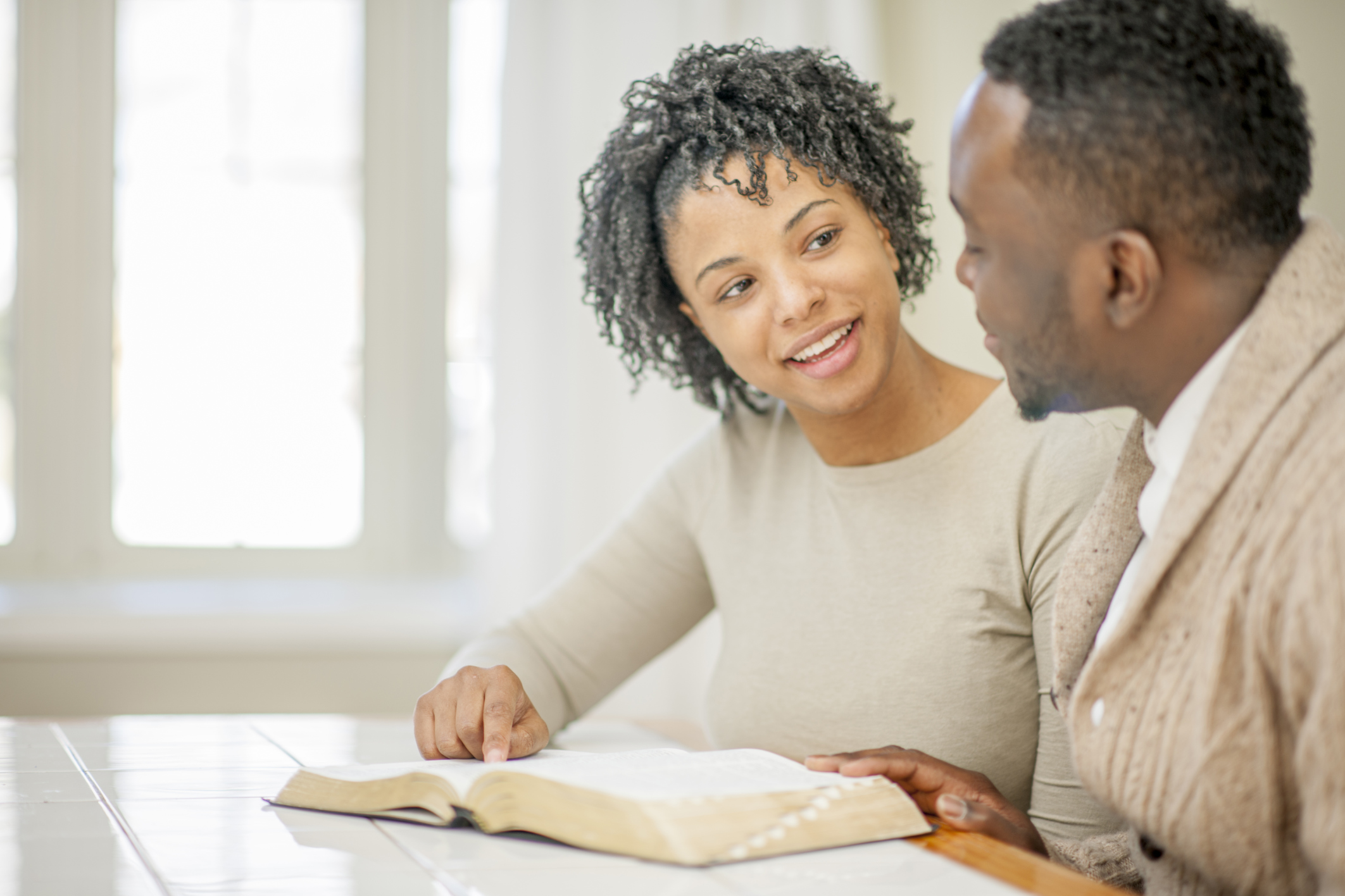Husband and Wife Studying the Bible Together
